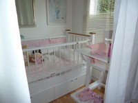 Peeping through the curtains.