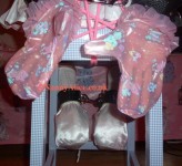 All wrapped up in pink cord and leather cuffs...